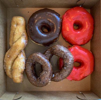 A pig out session for two- Cinnamon Twist, Chocolate Raised, Blueberry and the Cherry Raised.