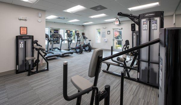 State of the art fitness center with cardio and strength training equipment