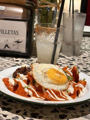 Chilaquiles, fried corn tortilla, red salsa