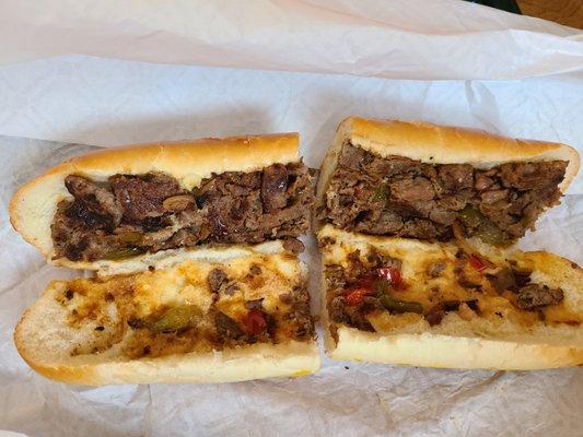 DiBella's Cheesesteak from Greece, NY.  $15.69+tax.The saddest peppers & onions on a steak sub I've ever seen.Certainly NOT worth $16. Booo!