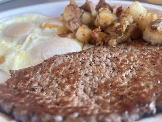 Breakfast entree of Steak and Eggs with potatoes, Yumm