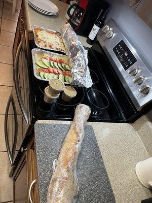 Breadsticks, chicken, Parmesan, and a salad