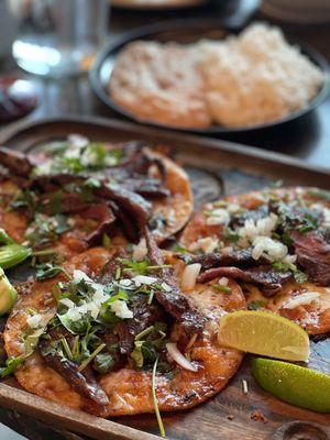 Tacos asada with refried beans and rice