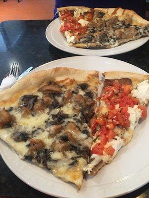 Chicken marsala pizza and half an eggplant pizza slice