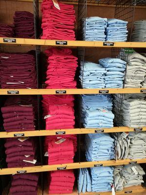 Shelves are packed with polo shirts!