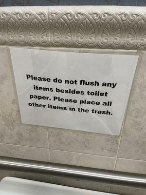 Does this mean poop in the trash can?