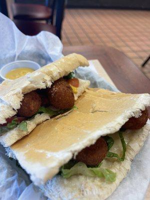 Pan con croquetas. Cheese sticks filled with ham