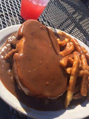 Open faced roast beef sandwich with gravy french fries