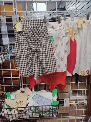 Vintage aprons and hankies make great gifts.