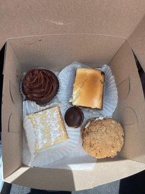 GF chocolate cupcake, GF cheesecake brownie, GF lemon bar, GF macaron, GF oatmeal cream pie