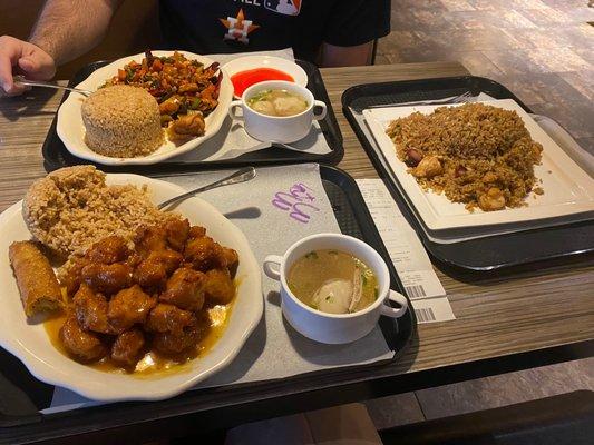 Orange chicken plate, house special fried rice and kung pao chicken plate.