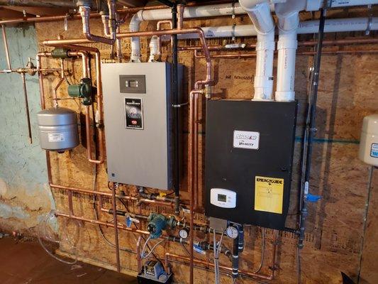 High efficiency units. Crown boiler and Bradford and White tankless hot water heater.