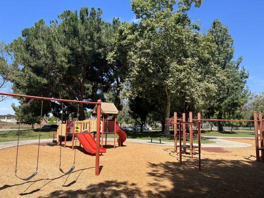 Good size playground with 4 baby swings and two older kid swings