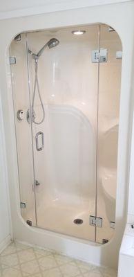 Replaced our 25 year old Aquaglass steamer shower with a much nicer new glass enclosure.