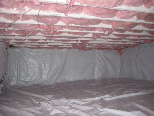 After. This is a typical 6 Mil Poly mesh reinforced vapor barrier install.