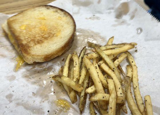 My wife's grilled cheese and fries.  Wish I'd ordered my own fries.