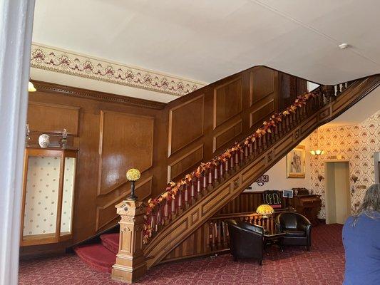 The grand staircase up to the rooms. There is also an elevator for accessibility.