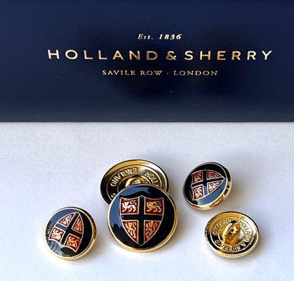 We are licensed distributer of Holland & Sherry signature button collection.