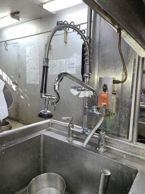 Commercial kitchen sink faucet replacement.