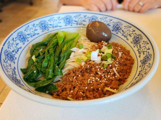 Spicy Ground Pork Dry Noodles, add egg