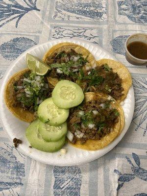 Tacos de asada with some fresh cucumber