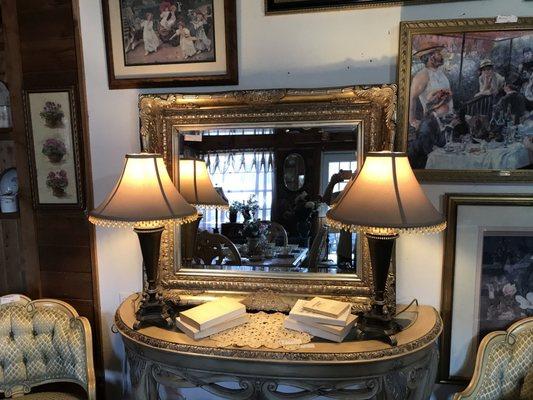 Lamps, paintings, buffet, sofa table