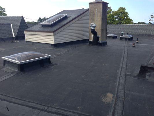 BEFORE/COMMERCIAL ROOF