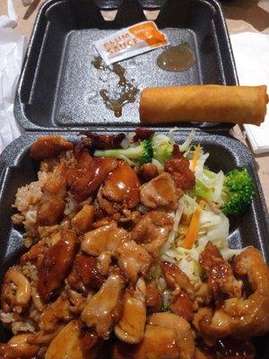 Teriyaki chicken, fried rice, veggies, spring roll.