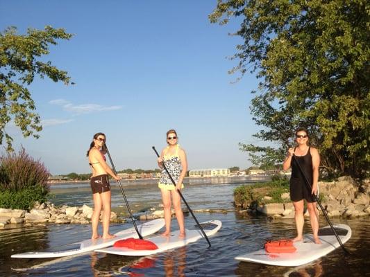 Paddleboarding on Pewaukee Lake, WI.  We offer Lessons, Rentals, and Yoga