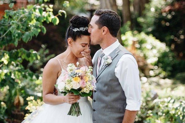 Emotional wedding couple after first look.