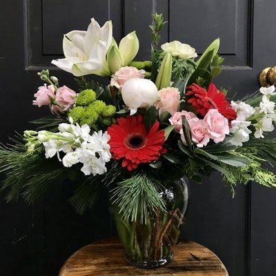 Not sure what to order? Trust our florists with a Designer's Choice arrangement. You'll get a gorgeous design with fresh & premium blooms.