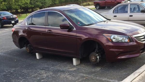 Yet another car on bricks. Just a typical morning at Riverstone.