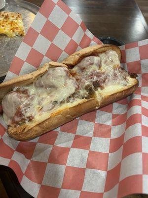 Steak Parmesan sub, no onions, with meatballs.