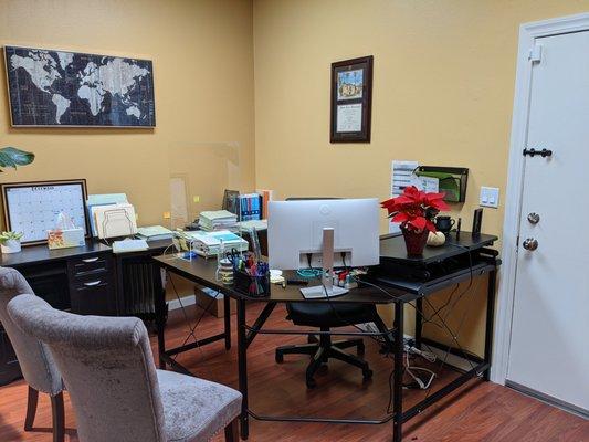 Pizano Law's paralegal desk.