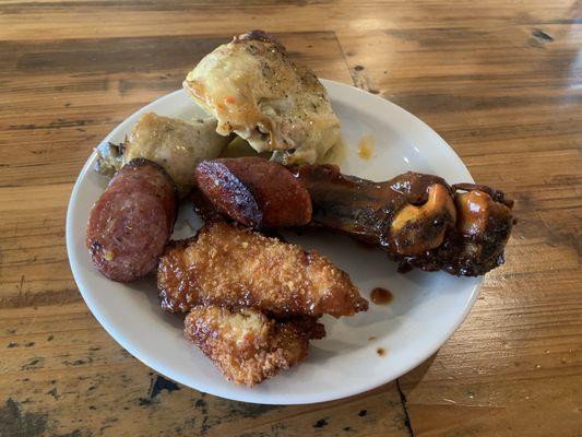 Lunch buffet round 1: chicken teriyaki, sausage, beef rib, lemon chicken.