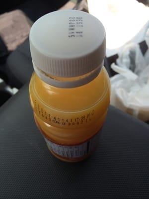 Rancid bottle of orange juice they sold me!  Notice the bubbles.  Putrid smell.