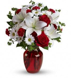 Custom arrangement of red rose that Everything Special can make