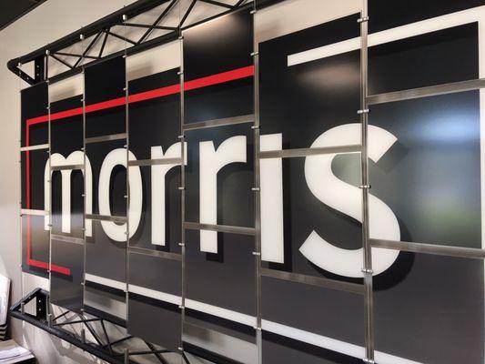 Architectural display of the Morris logo.