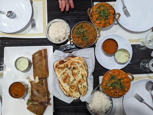 Our spread! Aloo Channa Chana Masala Garlic Naan Onion Masala Dosai Pesarat Uppuma Special Vegetable Curry