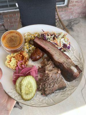 The Trinity, brisket, ribs, sausage, two sides