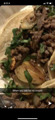 Kearny Carne asada tacos with a big ass onion pit in the middle