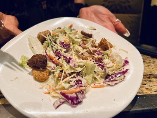 This is a...Caesar salad? With iceberg mix and carrot shreds?