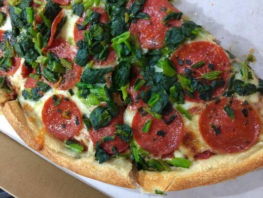 Large pizza with pepperoni and spinach