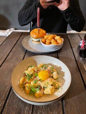 Tator tots, hamburger, cheese curds with bacon, carbonara sauce