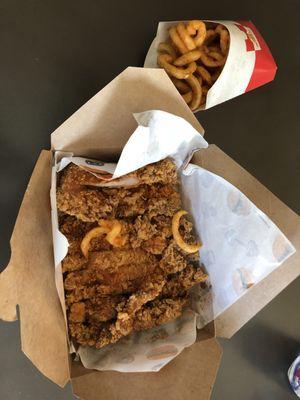 Curly fries and XL chicken steak.