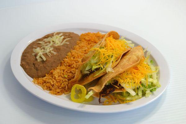 TACO MARK 
 TWO HARD SHELL TACOS BEANS AND RICE