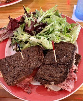 Reuben and fresh greens