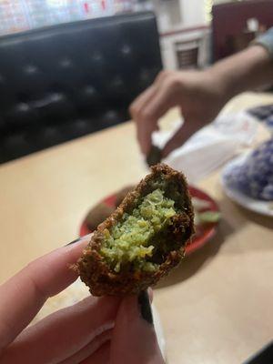 Inside of falafel. Personally, I would've preferred more flavor or salt.