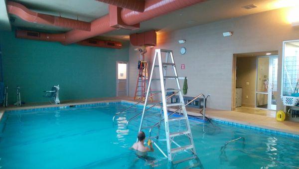 Duct work over Therapy pool. Our technicians didn't mind.