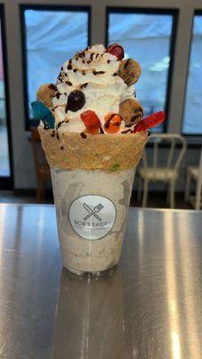 Cookies & Such Specialty Shake: Vanilla base infused with Fruity Pebbles, topped with Sprinkles, mini-Cookies, & Candies